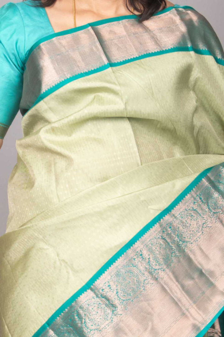 Sage green and teal green korvai silk saree