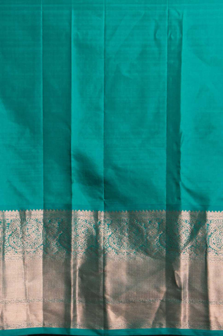Sage green and teal green korvai silk saree