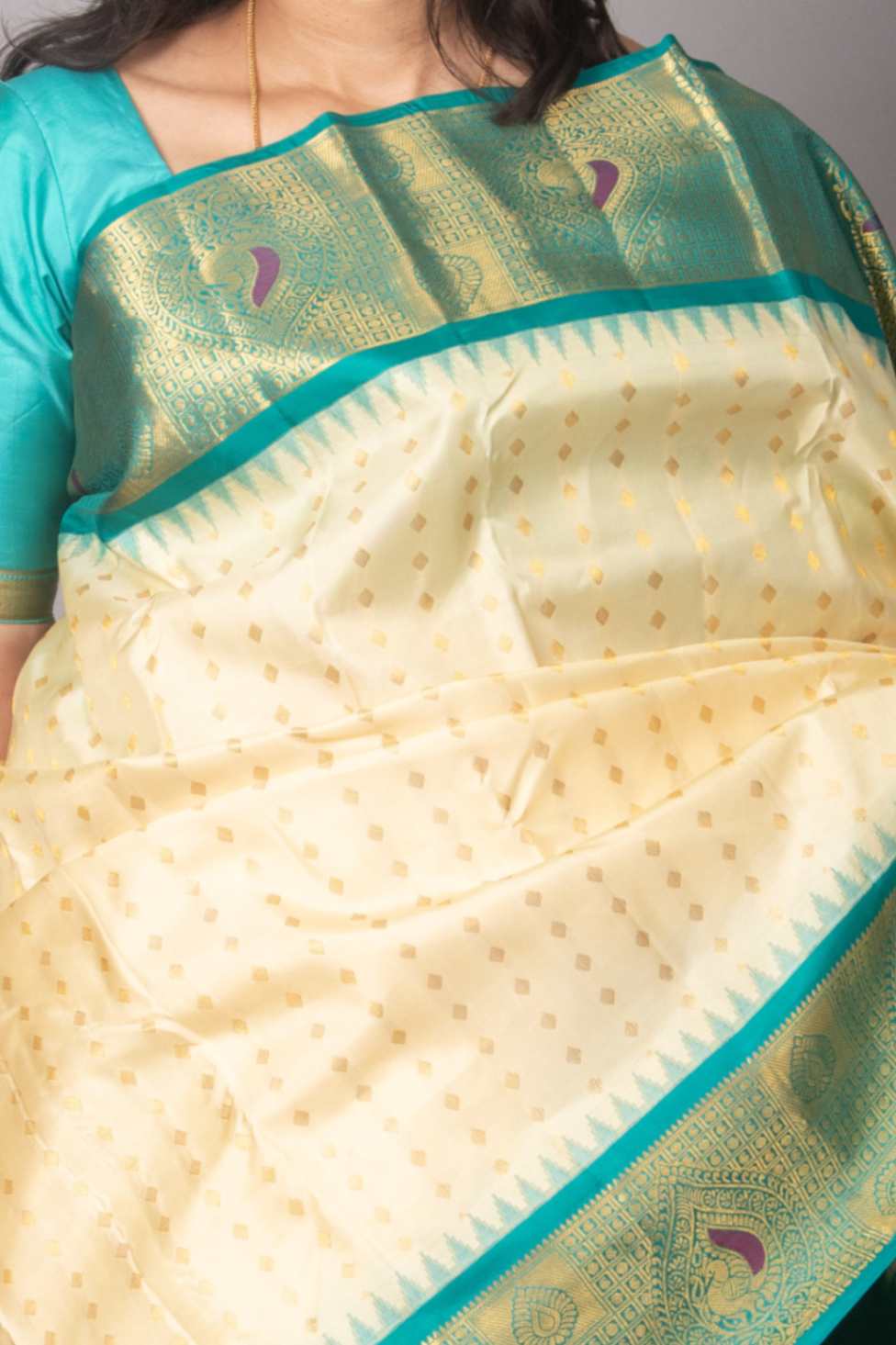 Offwhite and teal korvai silk saree