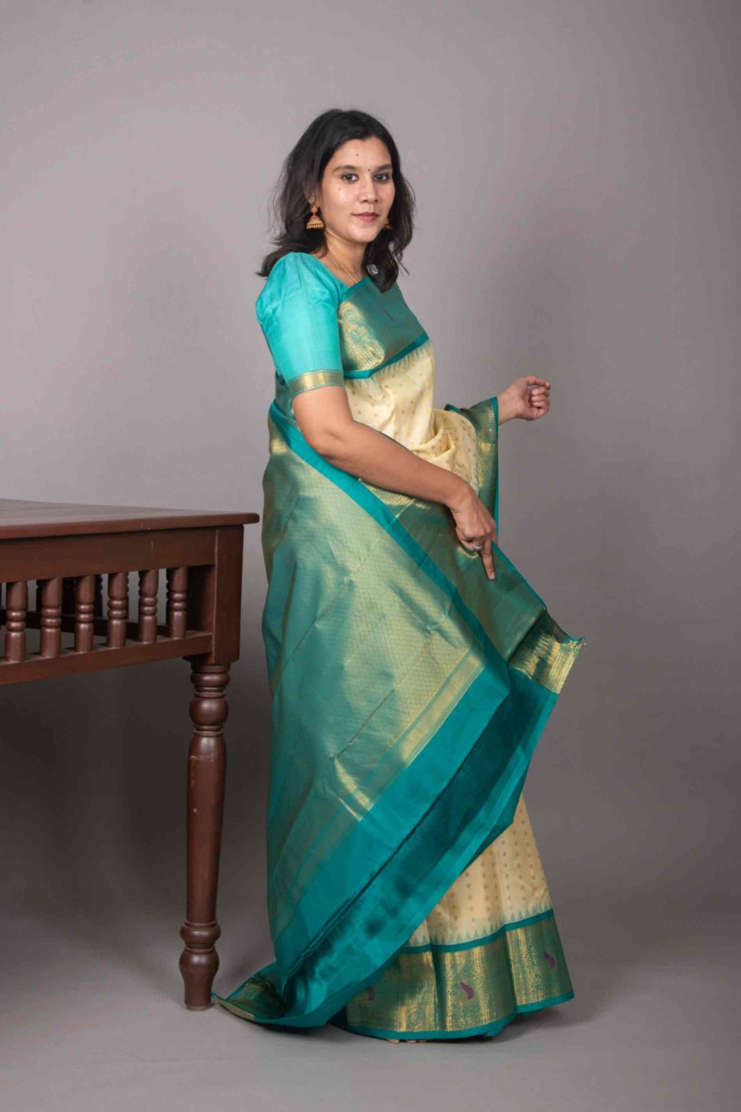 Offwhite and teal korvai silk saree