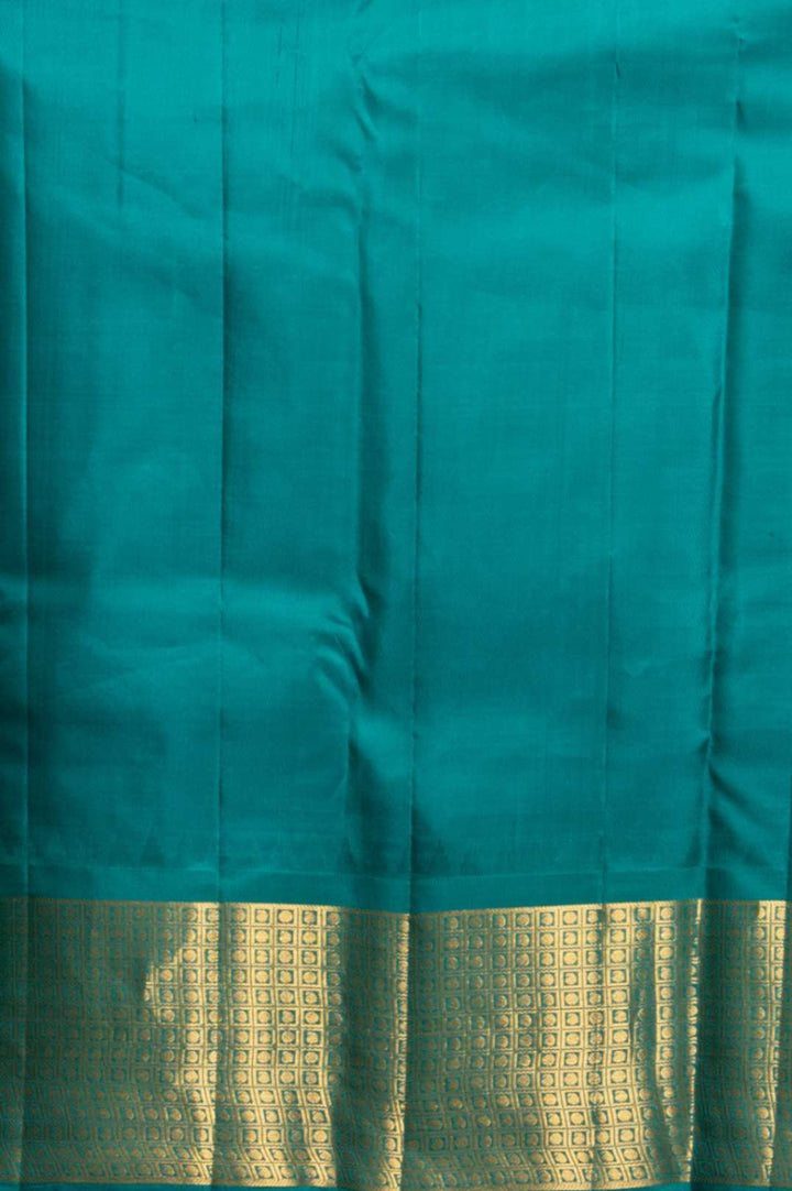 Offwhite and teal korvai silk saree