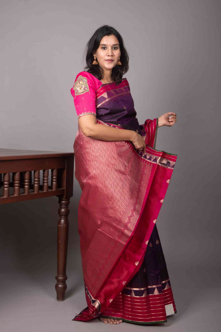 Purple and magenta temple border silk saree