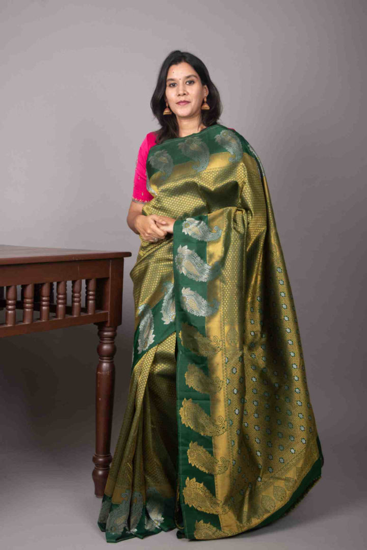 Forest green and paisley designer silk saree