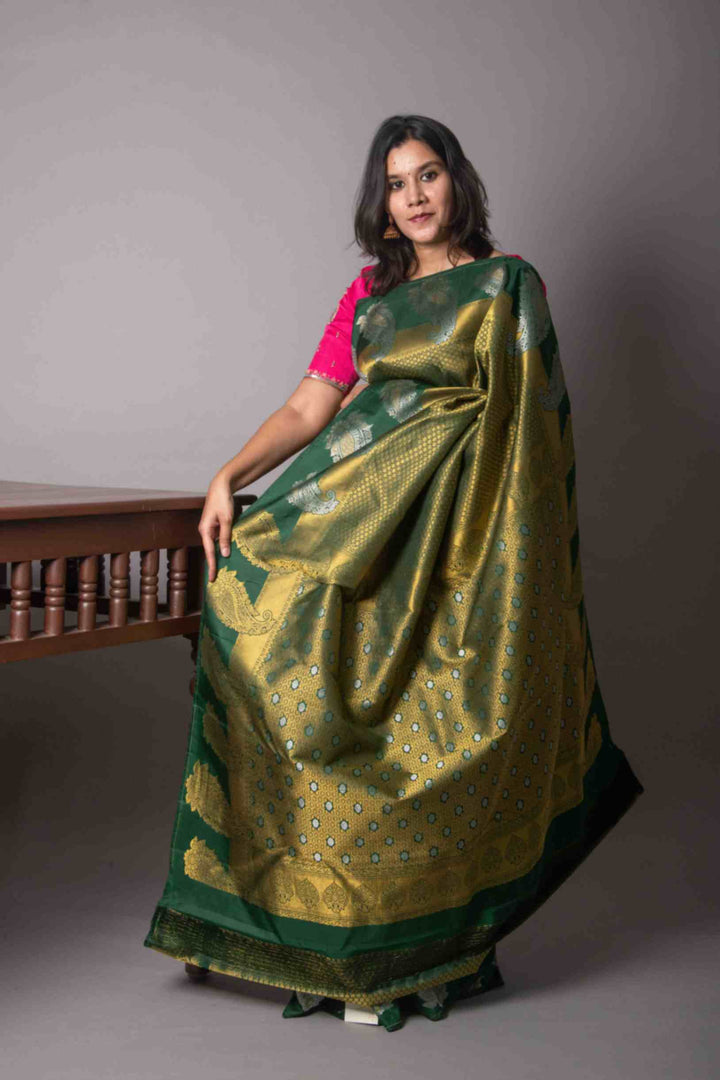 Forest green and paisley designer silk saree