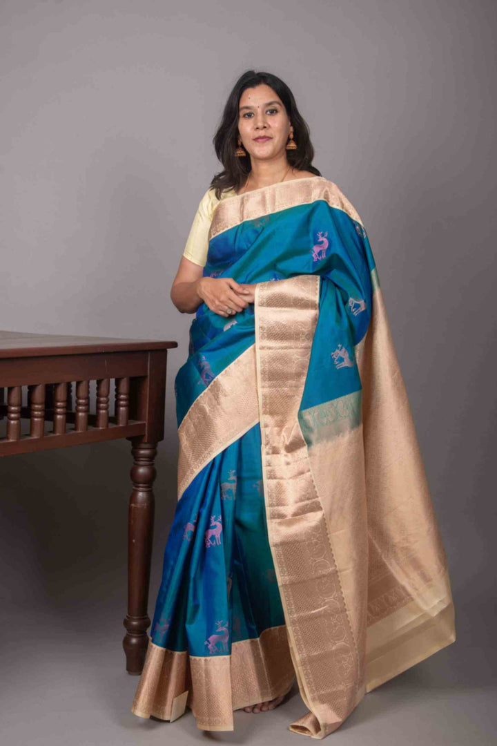 Peacock blue and cream korvai silk saree
