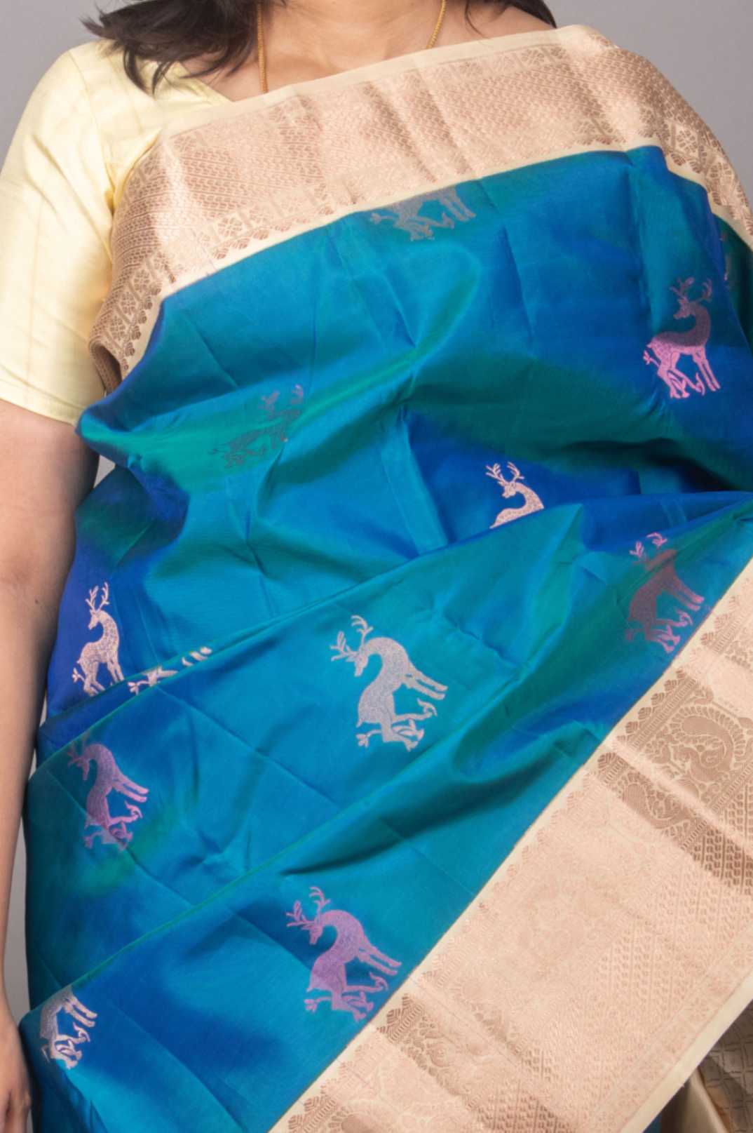 Peacock blue and cream korvai silk saree
