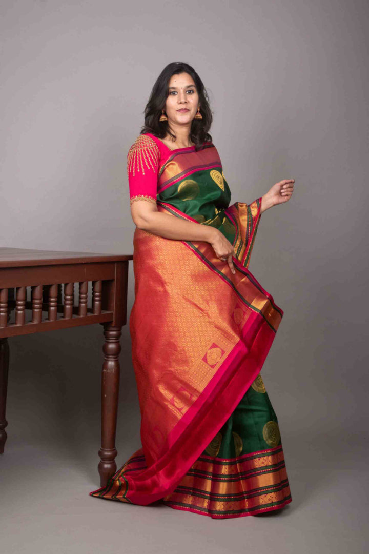 Green and pink korvai silk saree