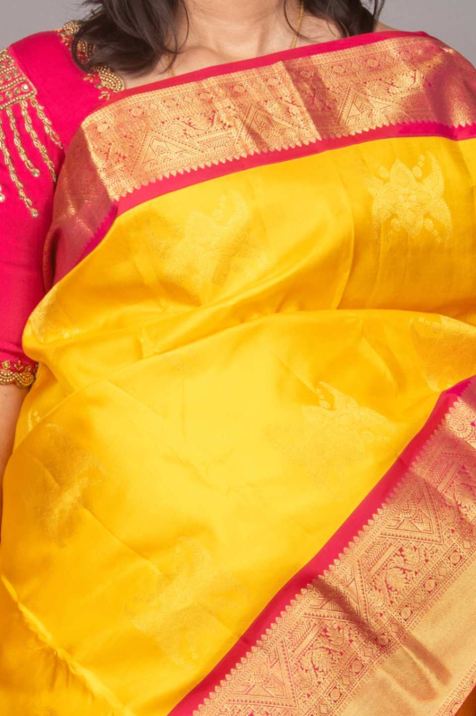 Yellow and magenta korvai silk saree