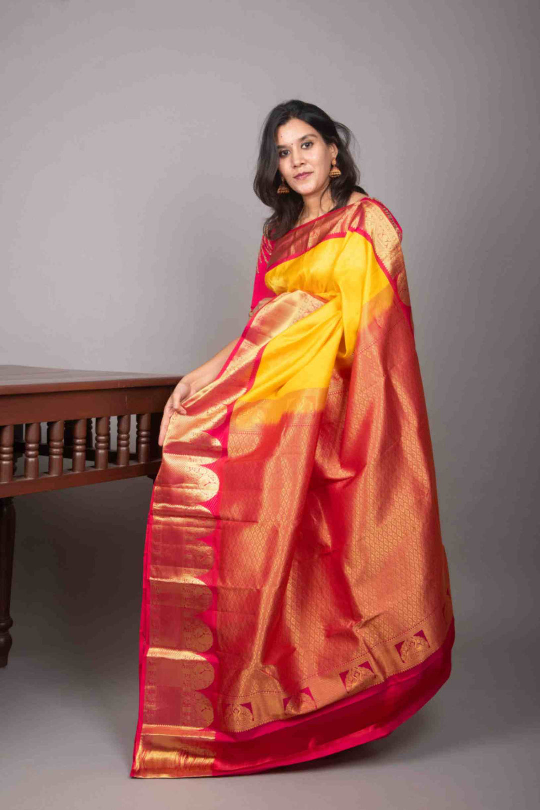Yellow and magenta korvai silk saree