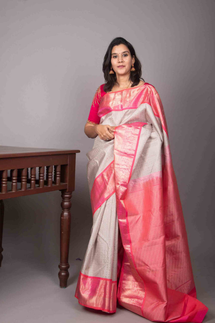 Icegrey and peachish pink aayiram butta silk saree