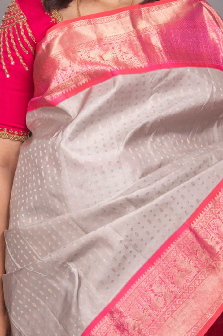Icegrey and peachish pink aayiram butta silk saree