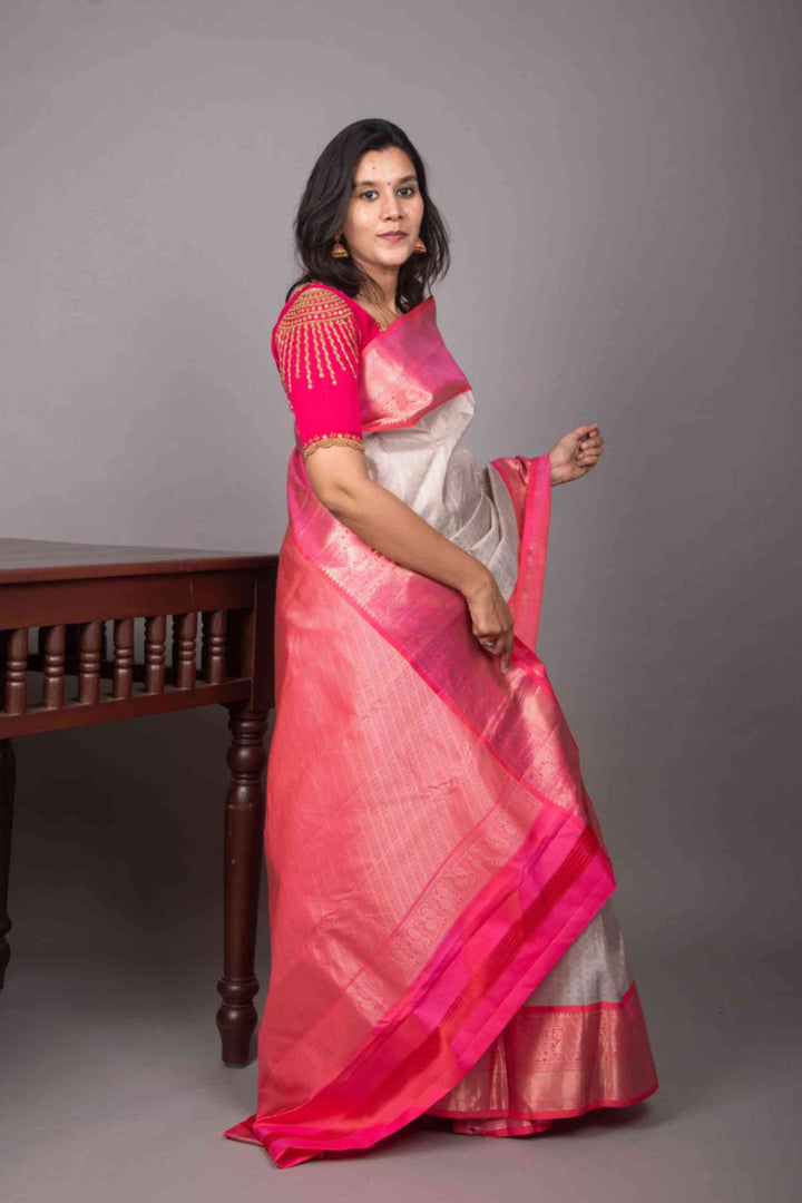 Icegrey and peachish pink aayiram butta silk saree