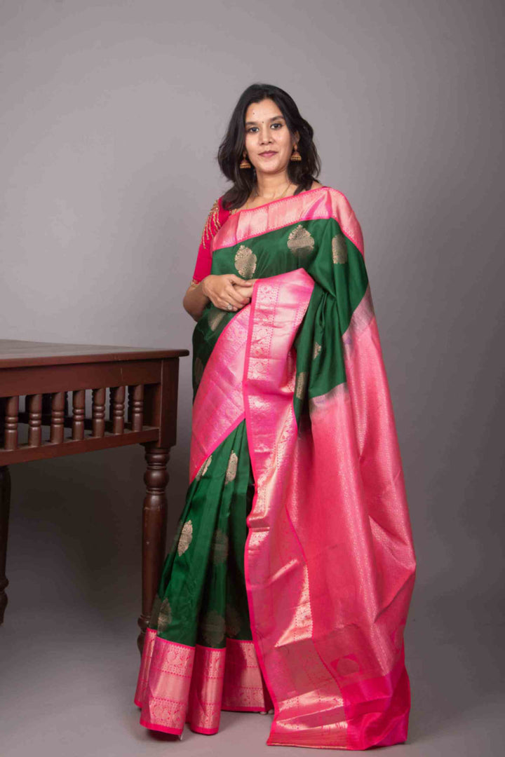 Forest green and rose pink korvai silk saree