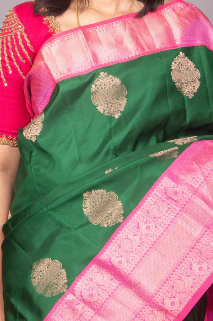 Forest green and rose pink korvai silk saree