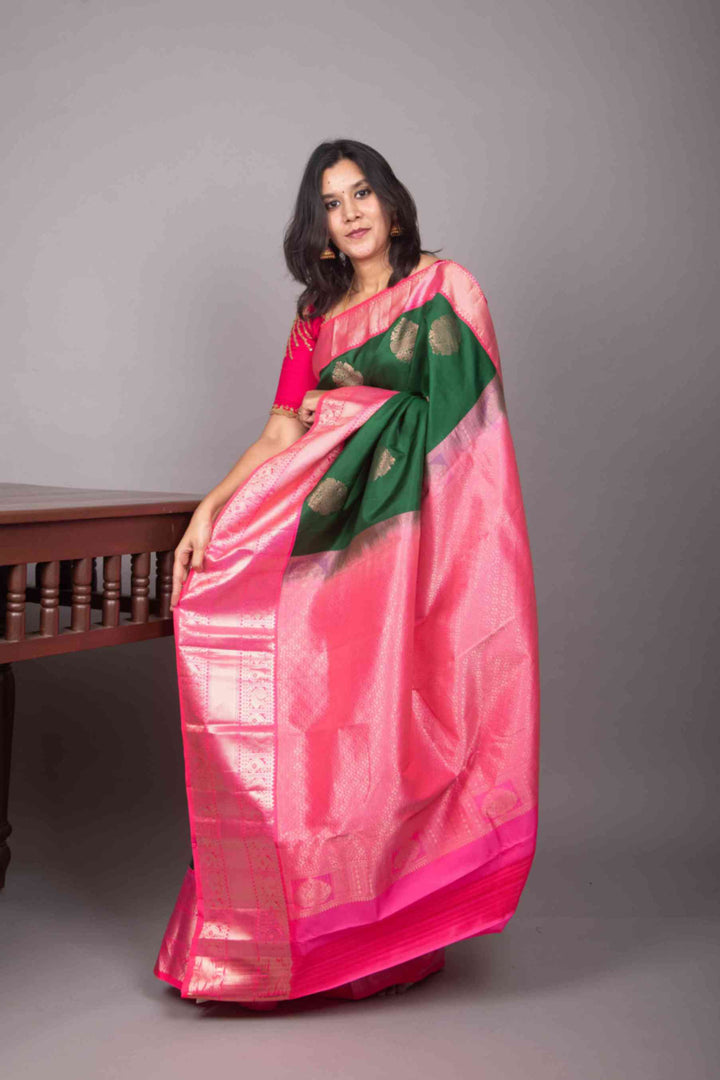 Forest green and rose pink korvai silk saree