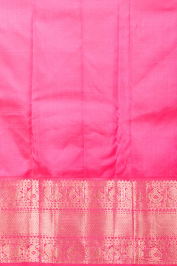 Forest green and rose pink korvai silk saree