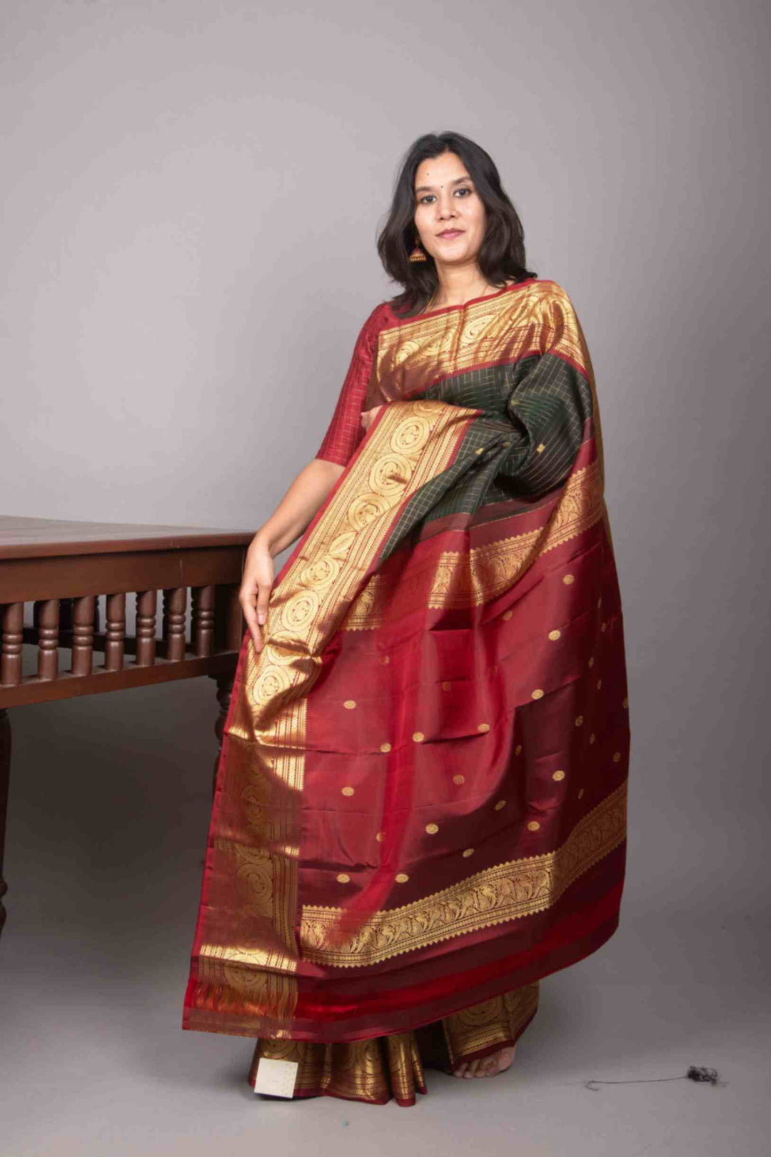 Green and red traditional silk saree