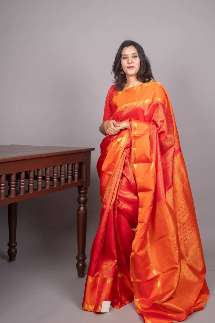 Red and orange kanjivaram silk saree