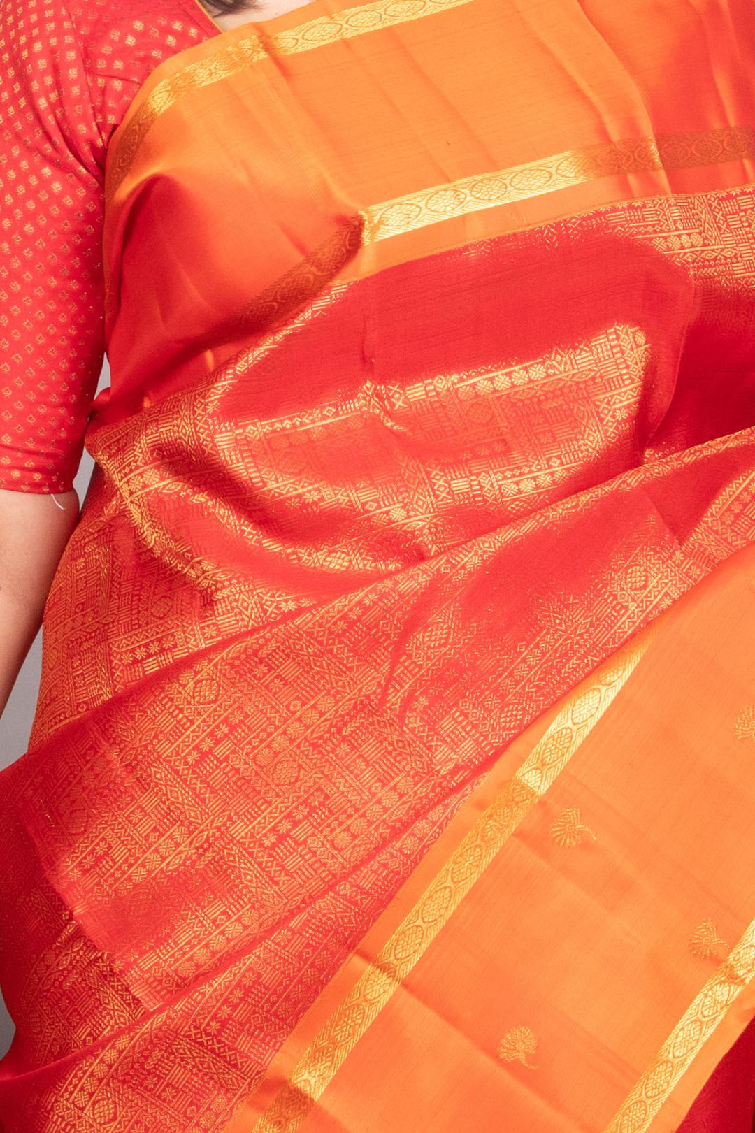 Red and orange kanjivaram silk saree