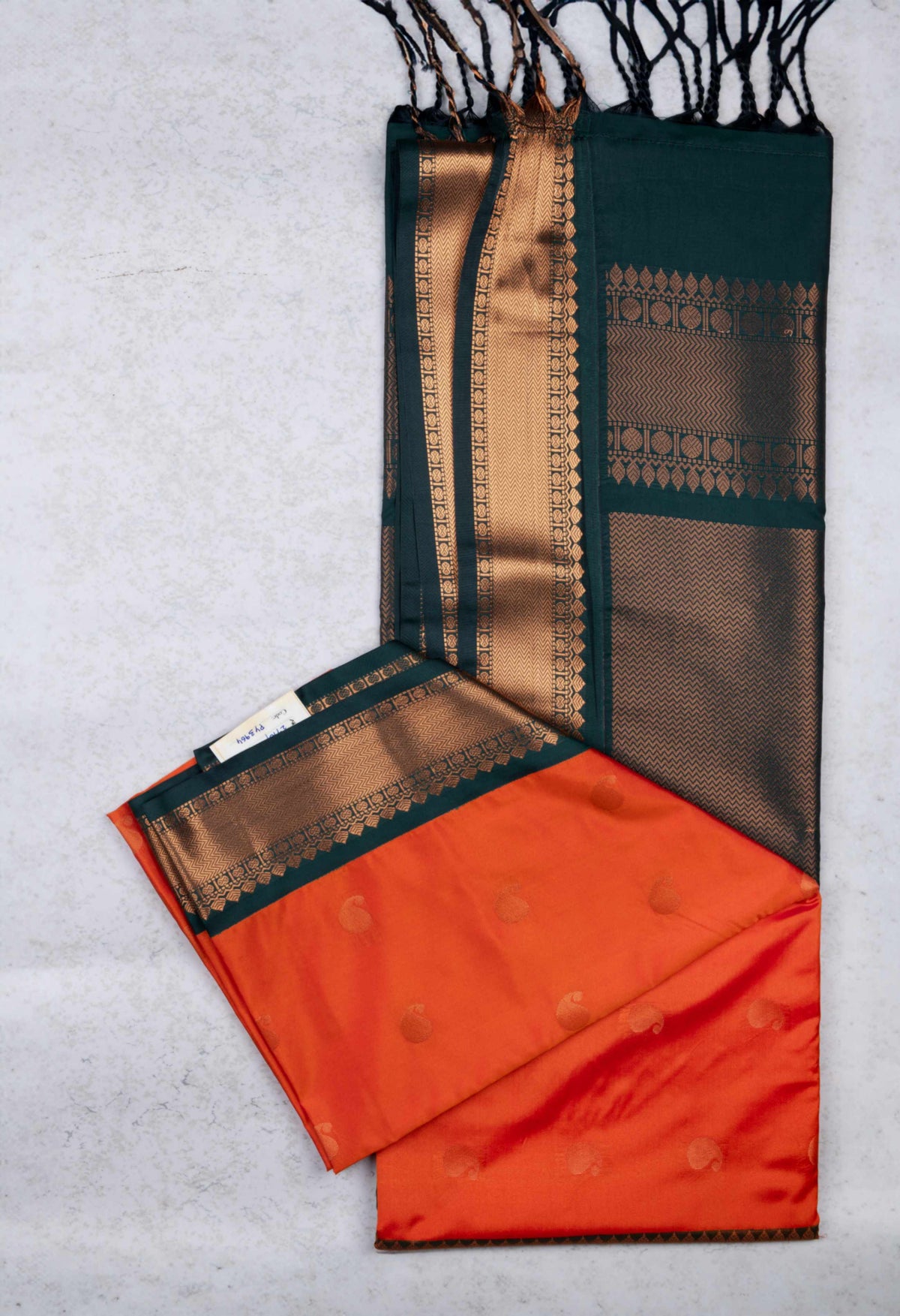 Orange and green semi soft silk saree