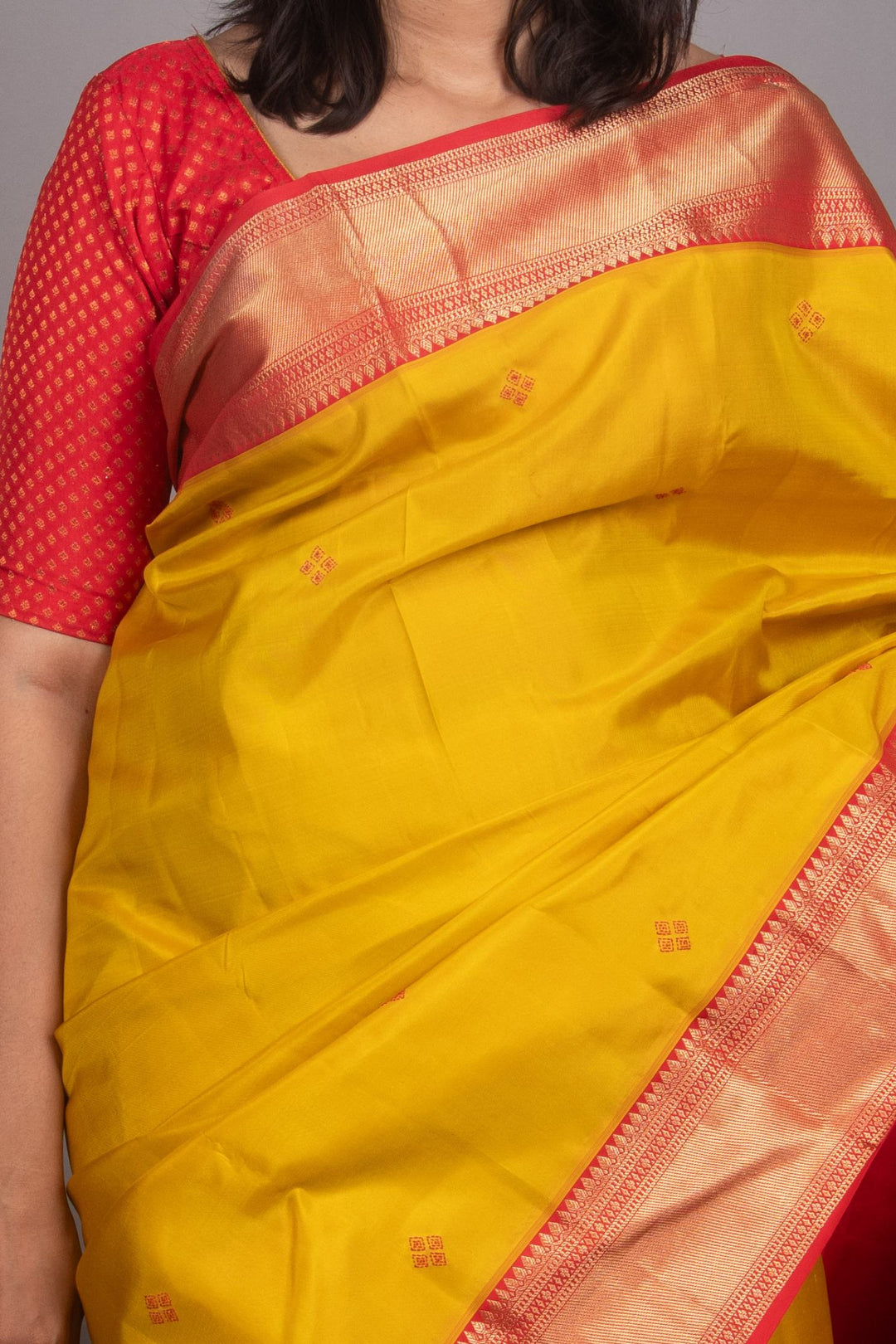 Saffron Yellow and Red Needle Embroidery Fusion silk saree