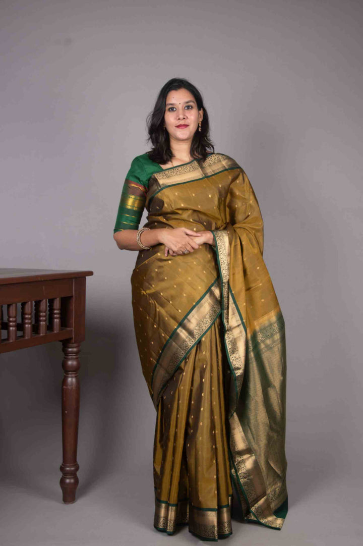 Mehendi green and Bottle green korvai silk saree
