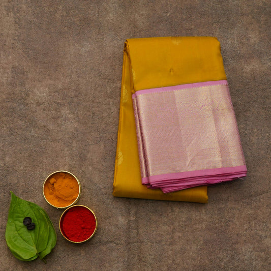 Mustard and pink korvai silk saree