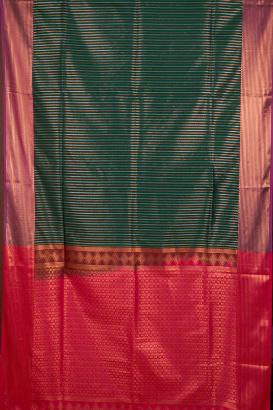 Dark green semi soft silk saree