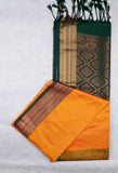 Mango orange semi soft silk saree