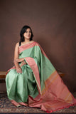 Pastel pine green soft silk saree