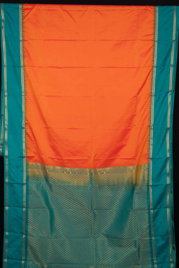Orange and green semi soft silk saree