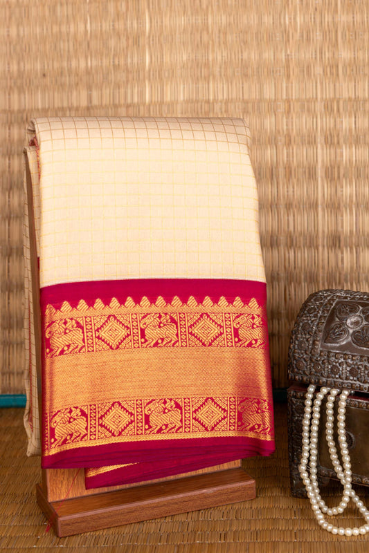Offwhite and magenta semi silk saree