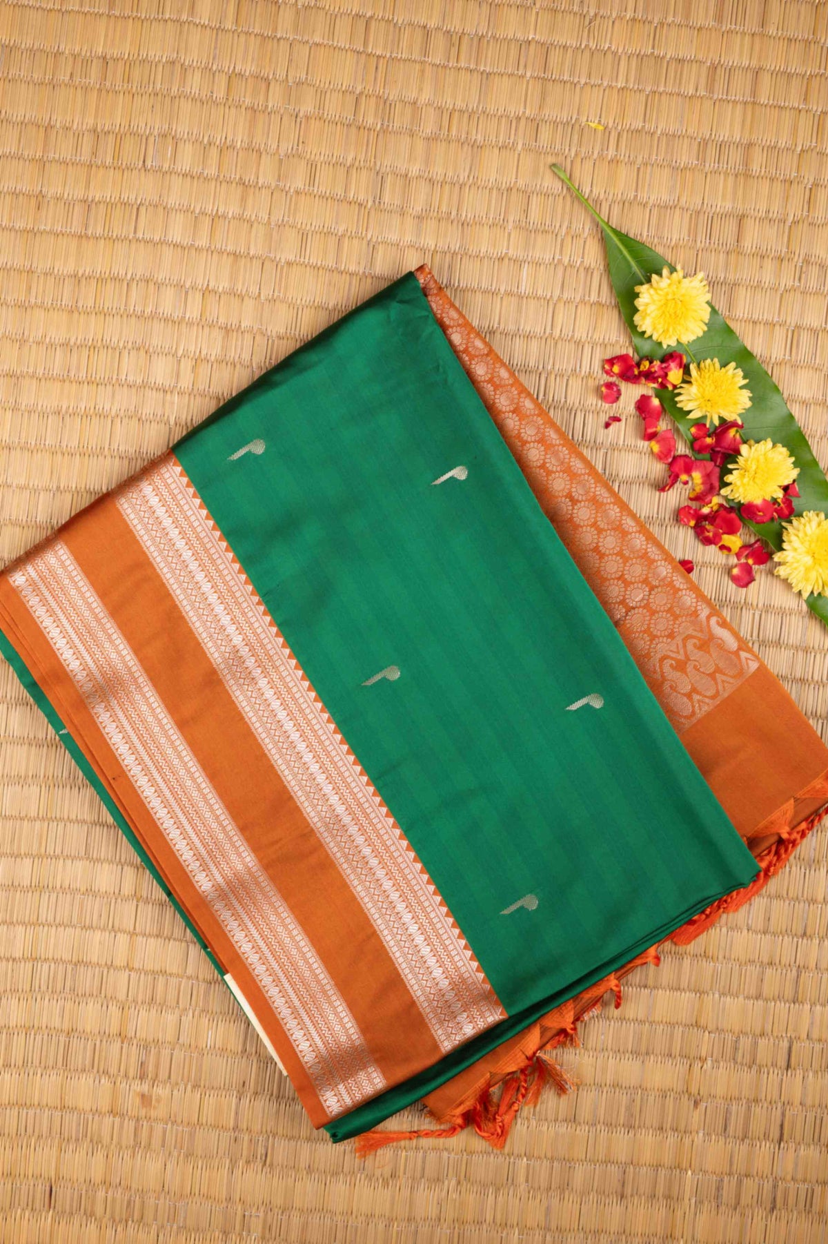 Green and orange semi soft silk saree