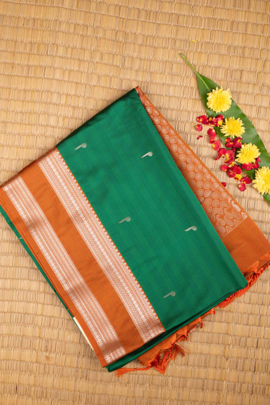 Green and orange semi soft silk saree