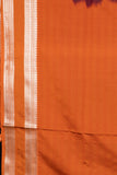 Green and orange semi soft silk saree
