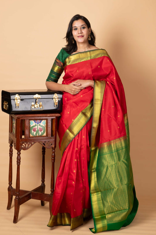Red and green small border silk saree