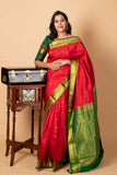 Red and green small border silk saree