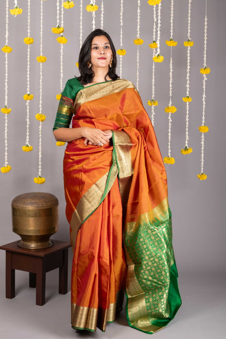 Honey brown saree with green border