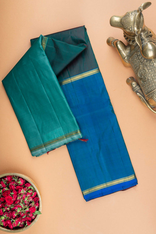 Blue and green mubbagam silk saree