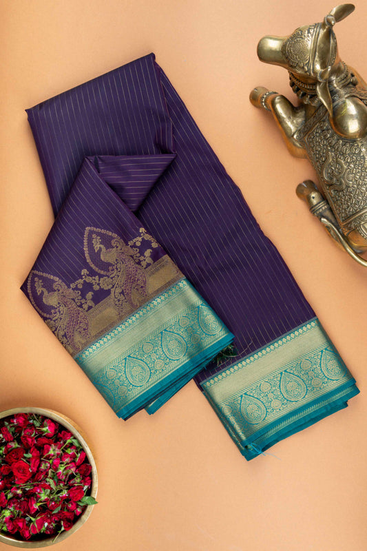 Jamun purple and teal green designer semi silk saree