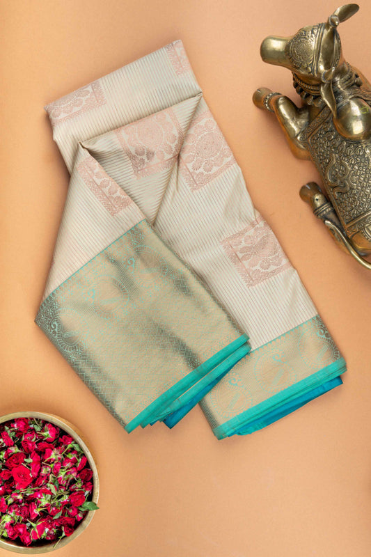 Offwhite and aqua blue semi silk saree