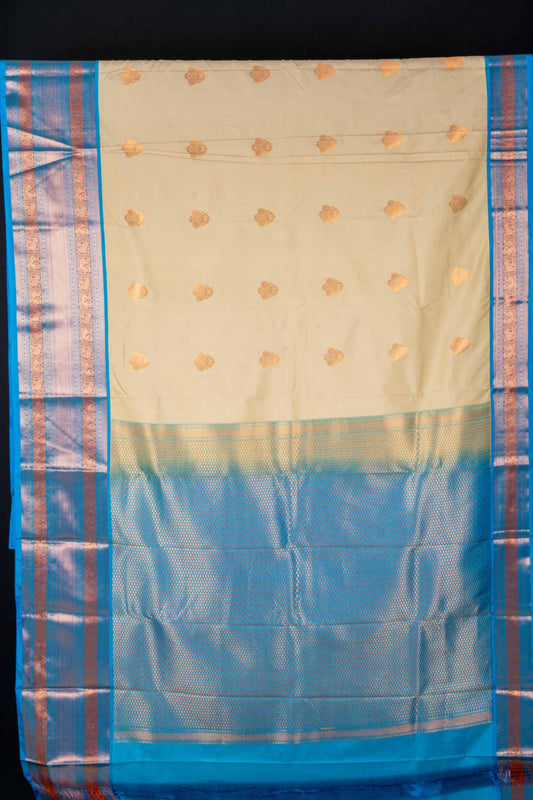 Offwhite and aanandha semi silk saree